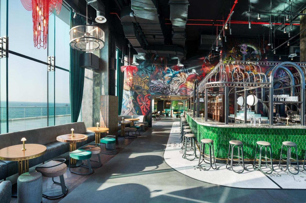 Hotel W Dubai - The Palm Esterno foto The interior of the bar