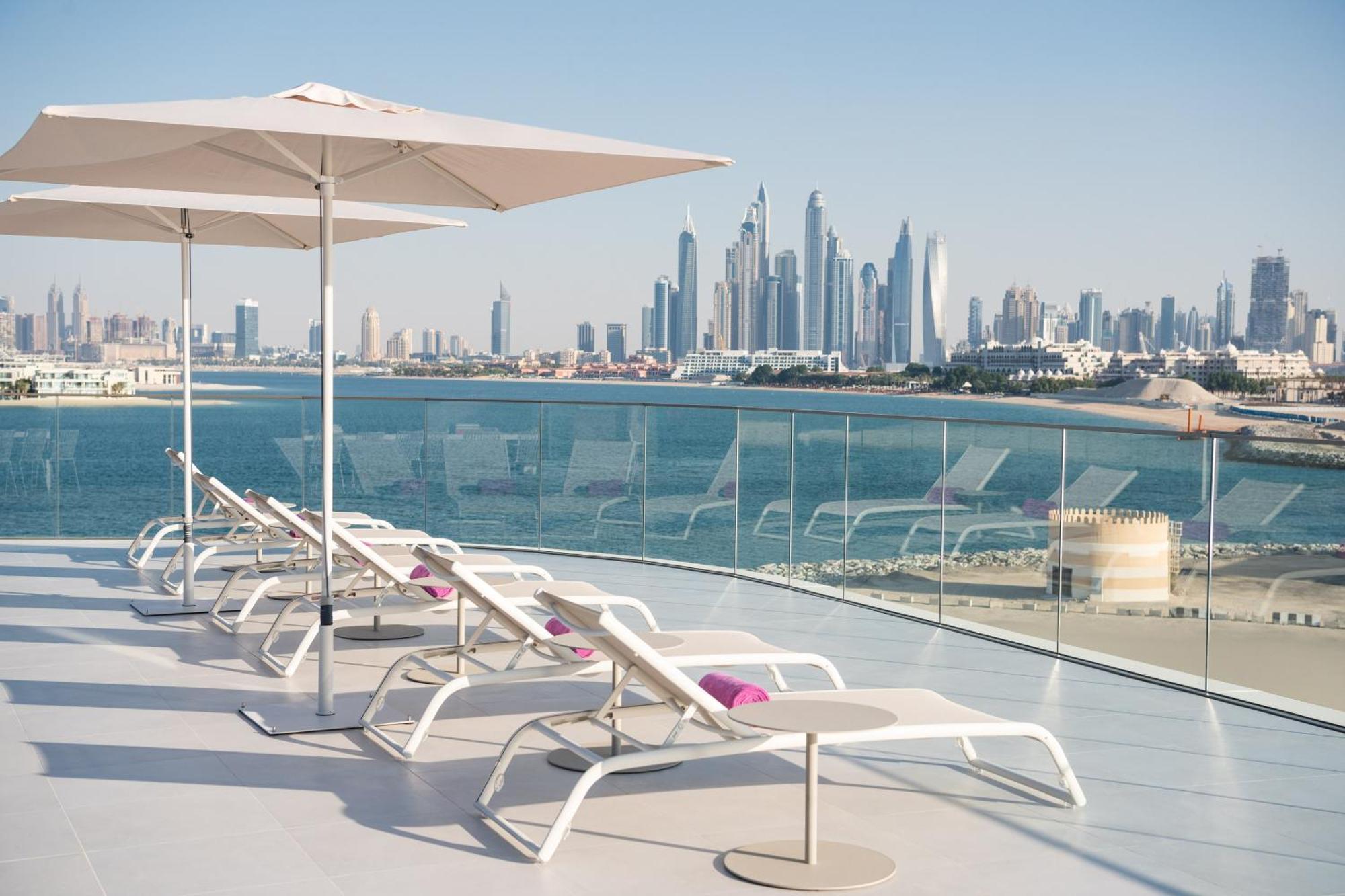 Hotel W Dubai - The Palm Esterno foto View of Dubai Marina skyline from the rooftop pool